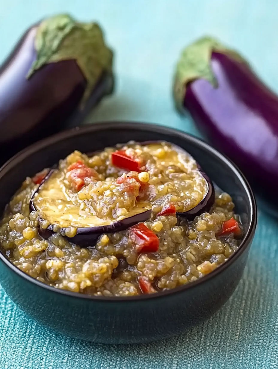 A bowl of food with a purple eggplant and a purple eggplant.