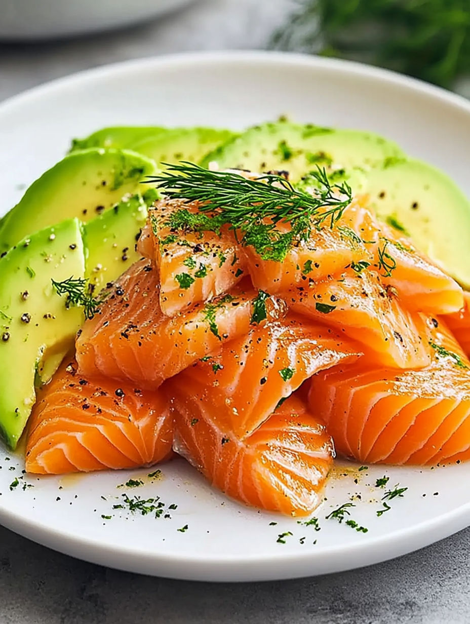 A plate of food with fish, avocado, and parsley.