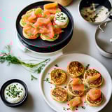 Blinis with salmon and cream.